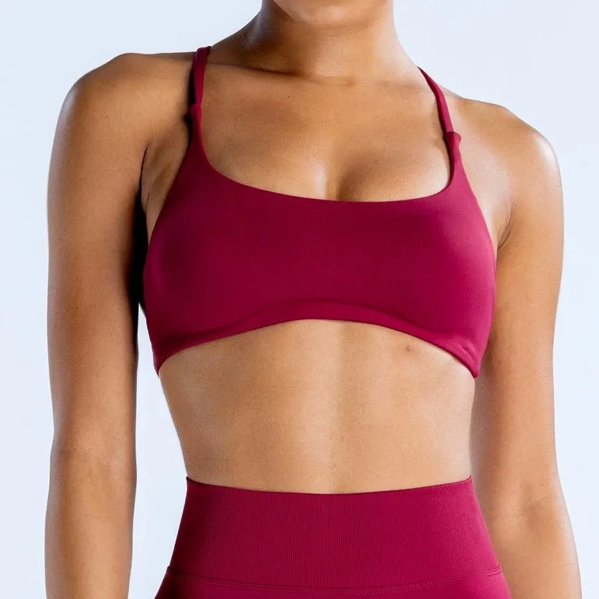 Dynamic Twist Back Sports Bra – Seamless, Strappy & Padded