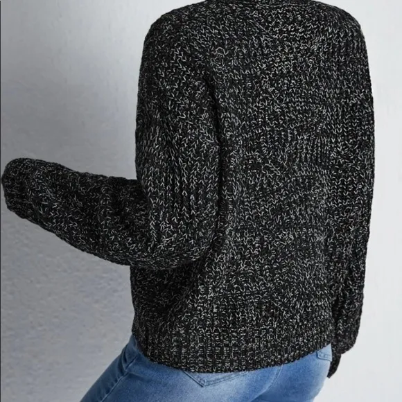 New black turtleneck sweater
