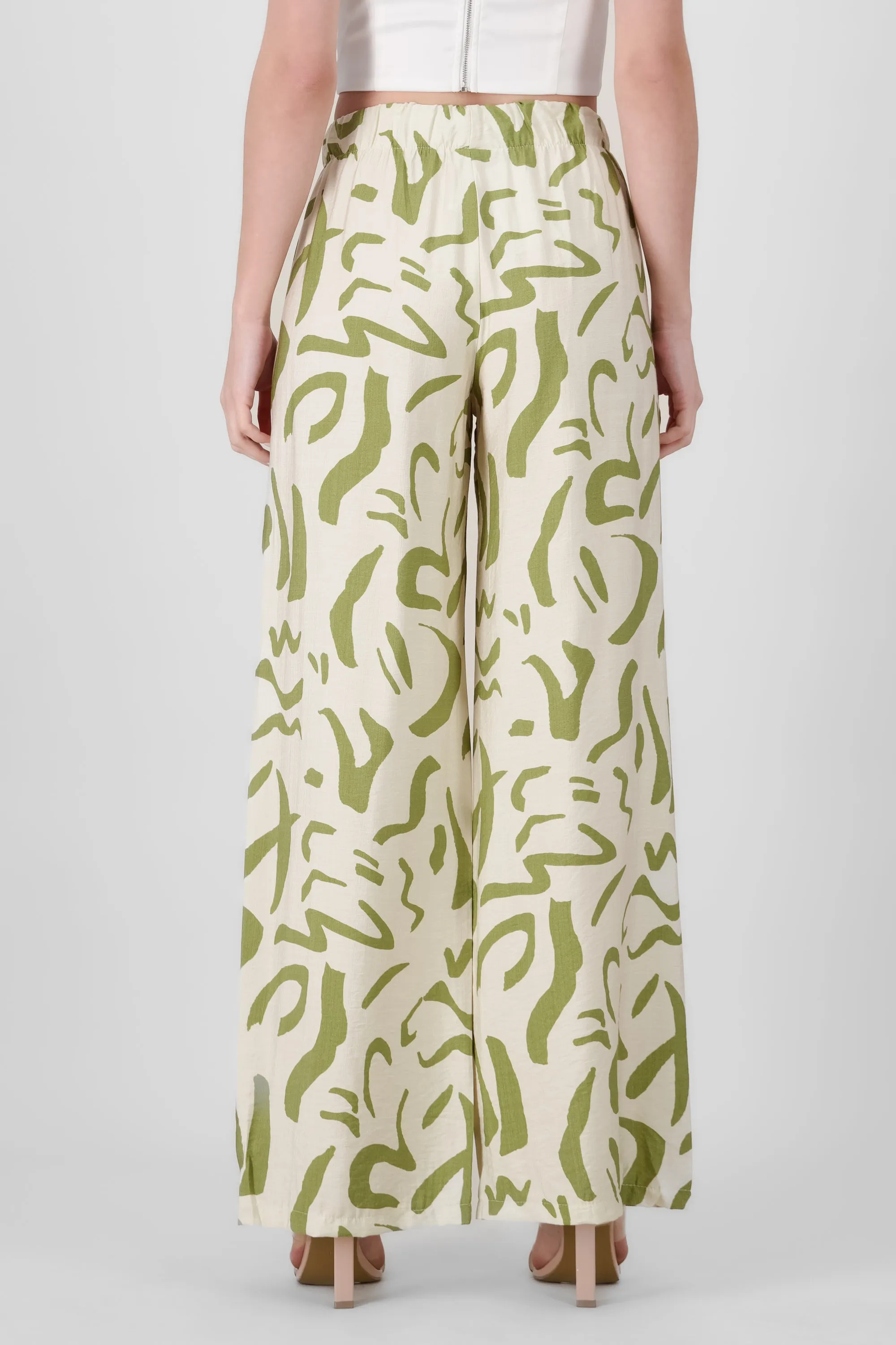 Pantalon fluido detalle estampado