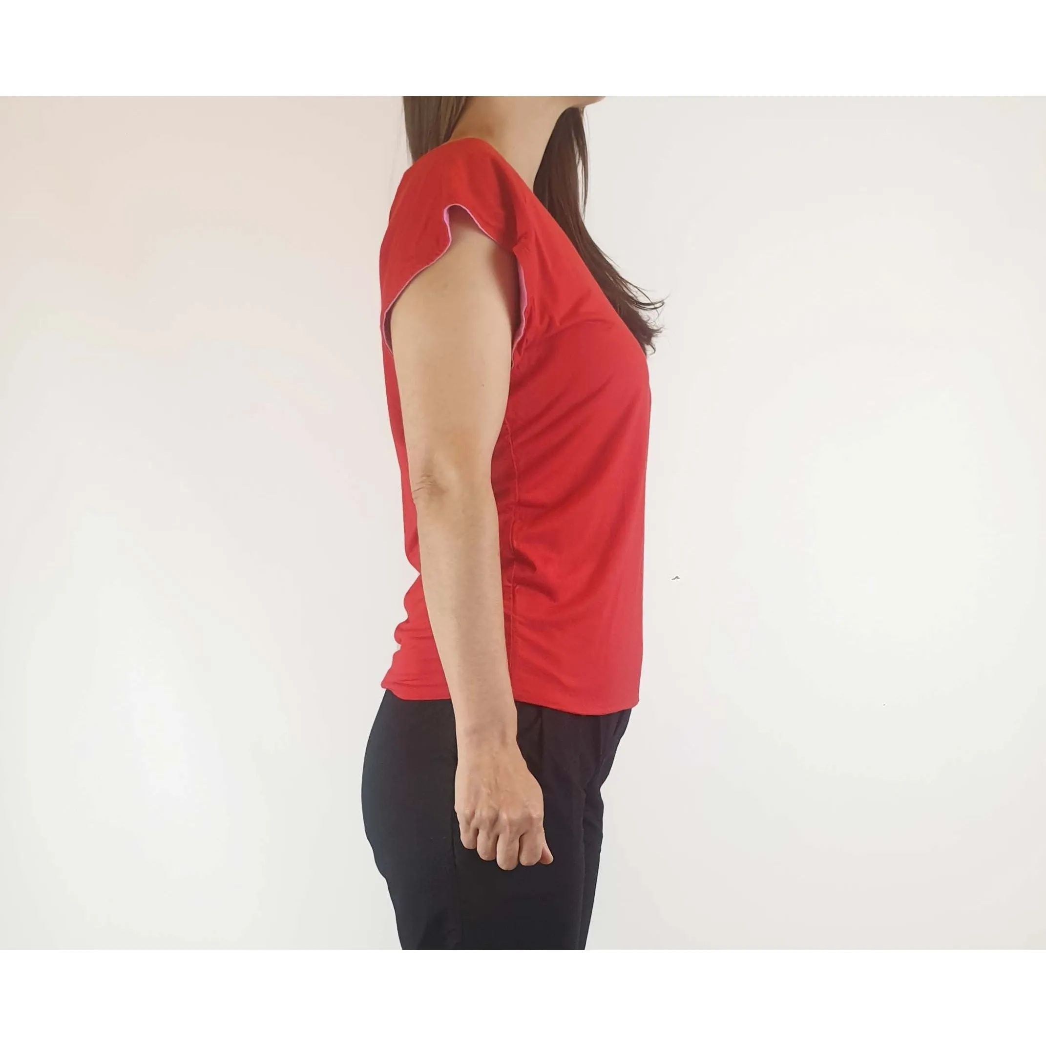 Reversible tee shirt top with red and pink sides best fits size 8