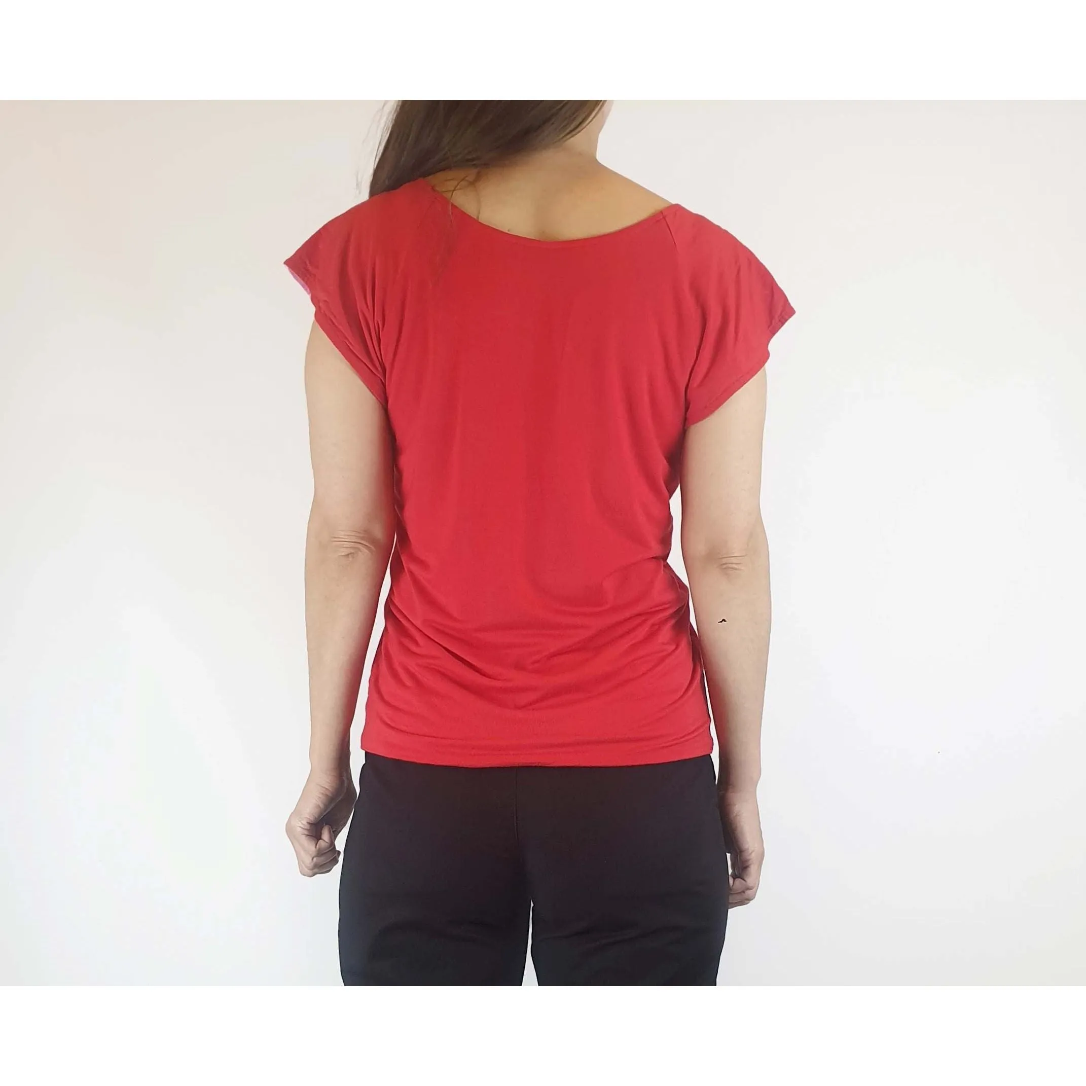 Reversible tee shirt top with red and pink sides best fits size 8