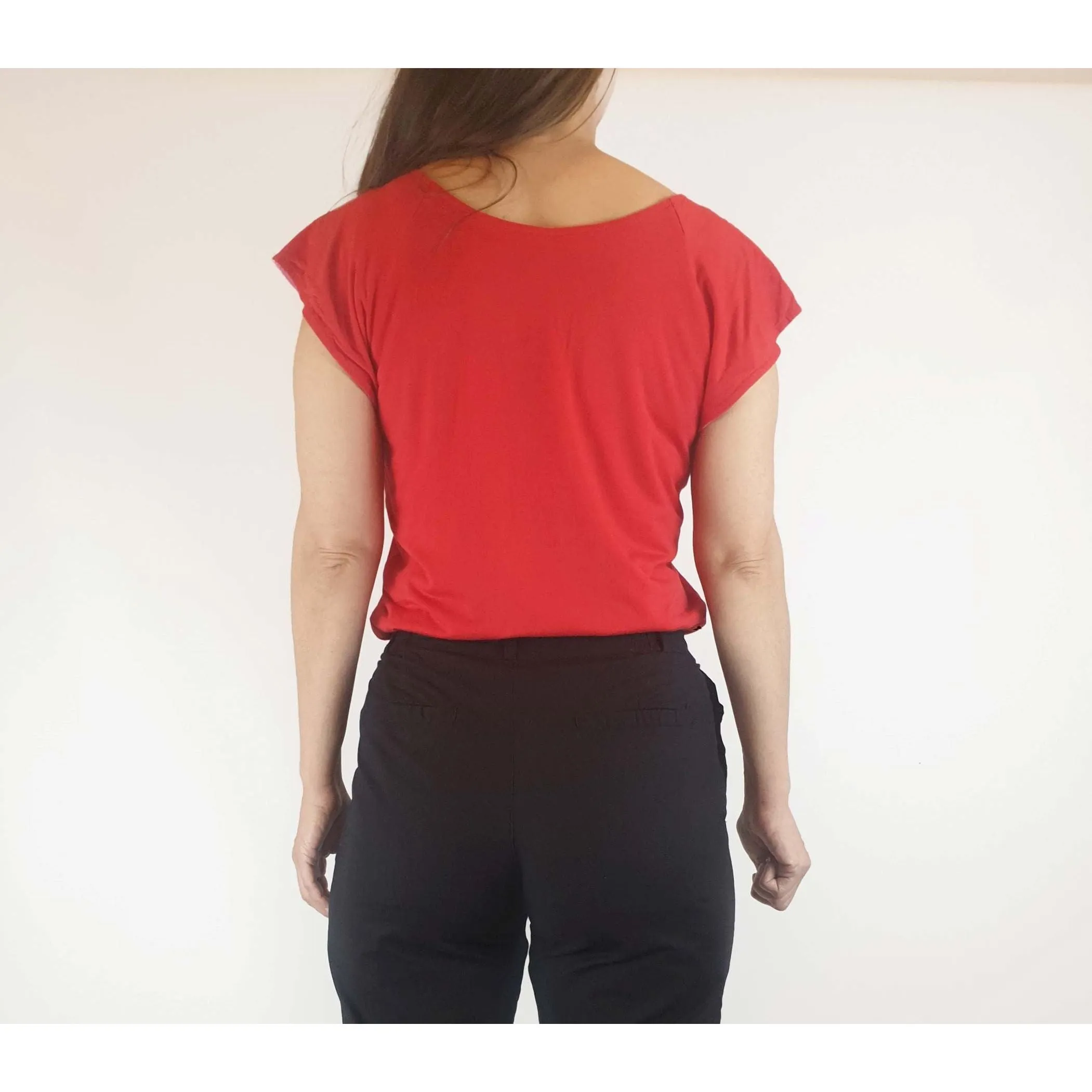 Reversible tee shirt top with red and pink sides best fits size 8