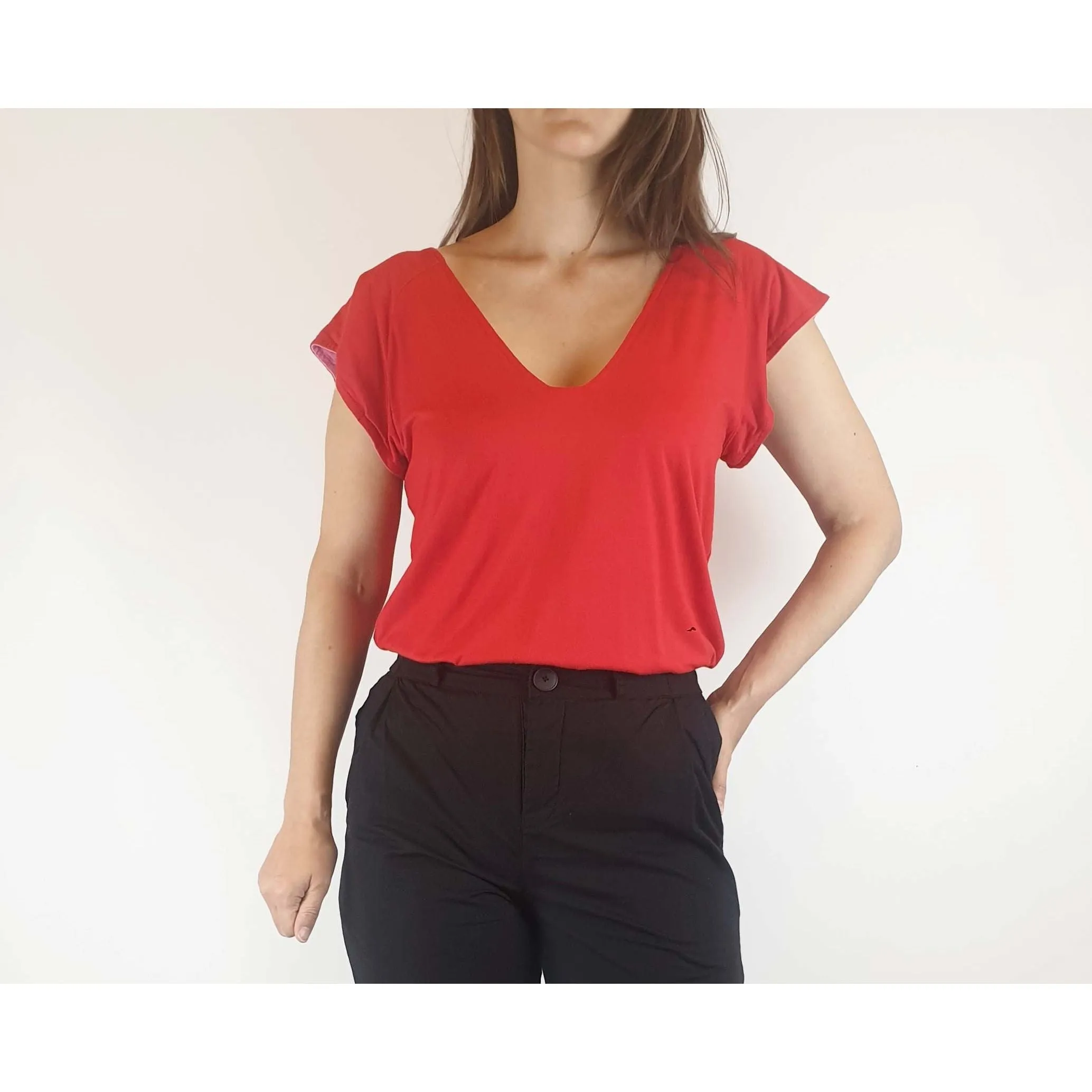 Reversible tee shirt top with red and pink sides best fits size 8