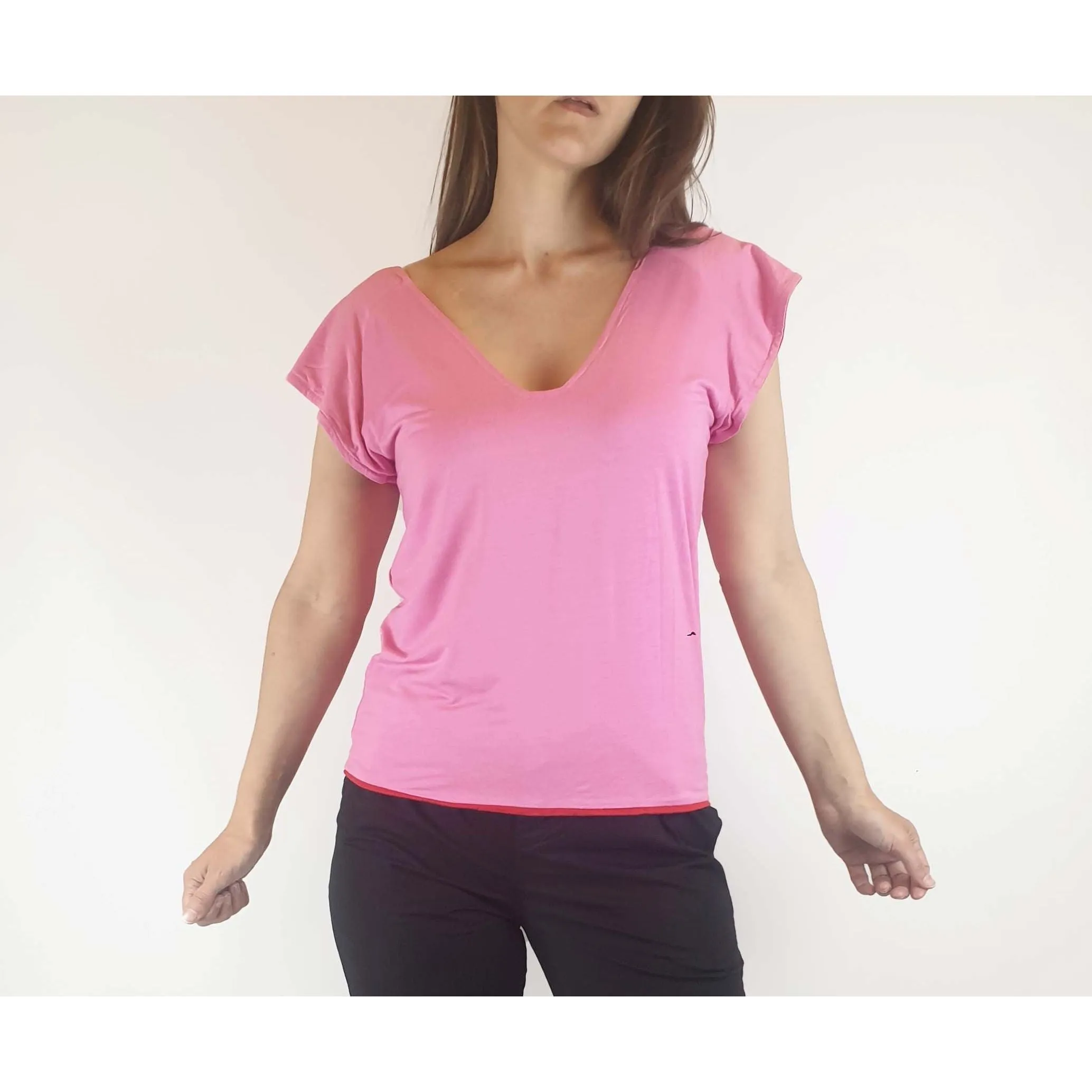 Reversible tee shirt top with red and pink sides best fits size 8
