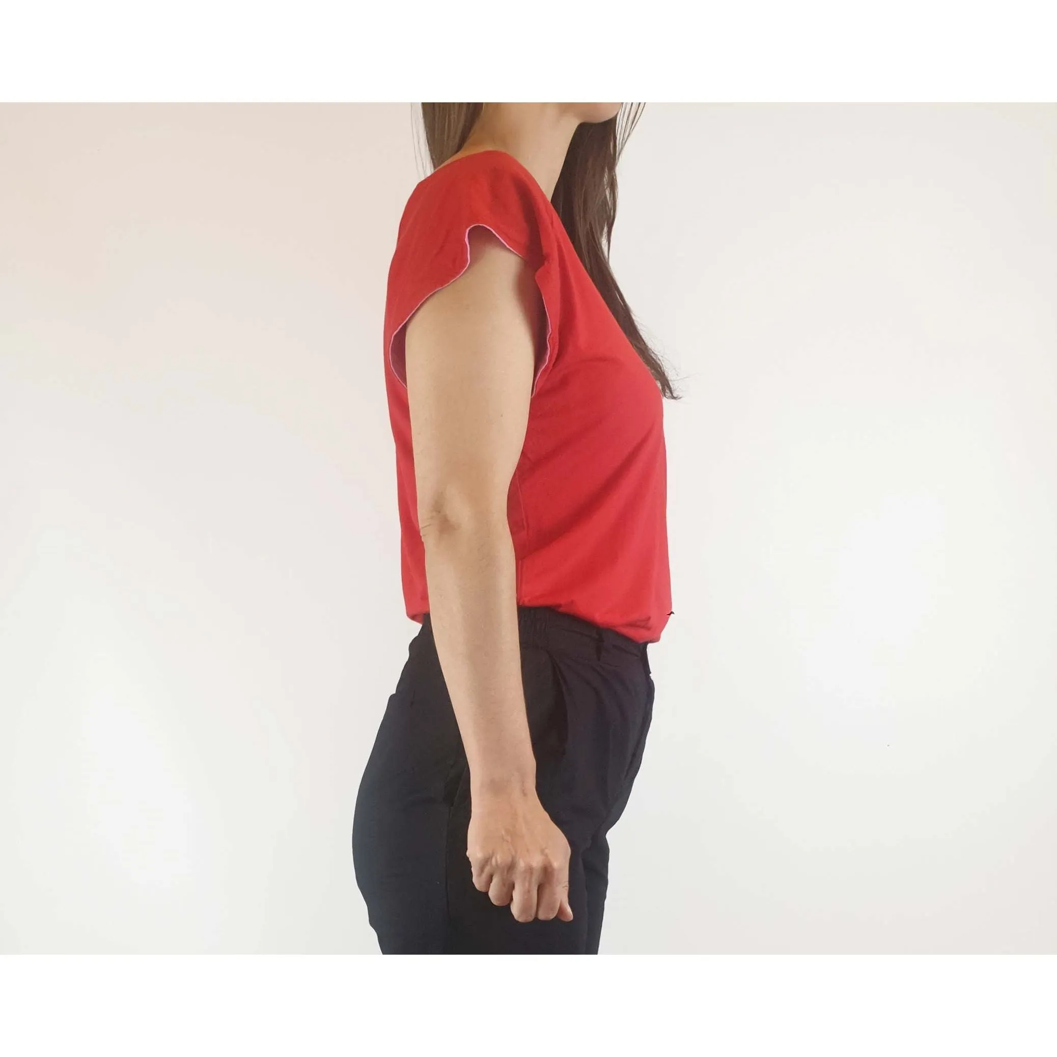 Reversible tee shirt top with red and pink sides best fits size 8