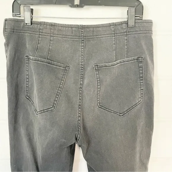 We The Free High Rise Crossover Waistband Stretchy Flared Washed Black Jeans 31